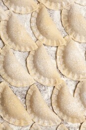 raw dumplings filled with cheese or food background