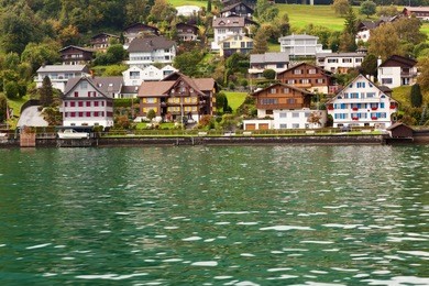 a small swiss village at lake luzern in switzerland