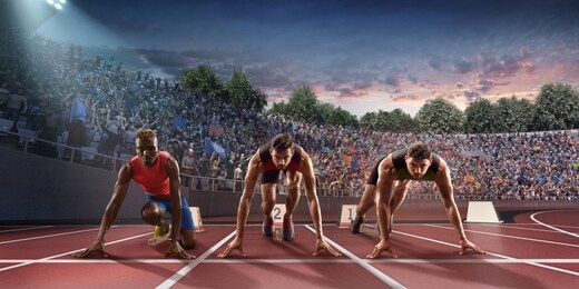 male athletes sprinting. three men in sport clothes on starting line prepares to run at the running track in professional stadiumrunning track, running, sports race, athletics, sports track, run, trac