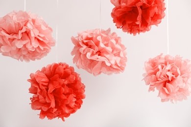 paper flowers at the girl baby shower party. baby shower celebration concept. festive party background. horizontal. living coral theme - color of the year 2019