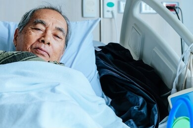 elderly patients in hospital bed