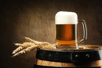 still life with a keg of beer and beer in the mug