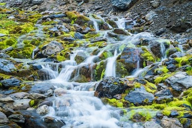 waterfall in martial glacier in ushuaia. detail of the little river. patagonia argentina