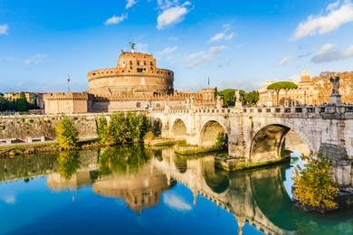 rome, italy: the mausoleum of hadrian, usually known as castle sant' angelo (castle of the holy angel), a towering cylindrical building in park adriano.