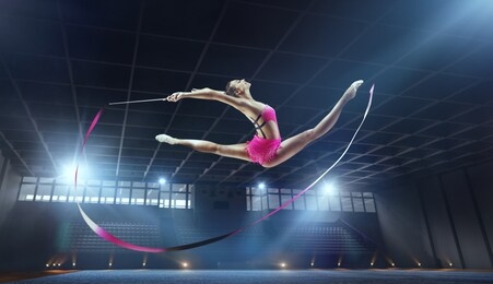 rhythmic gymnast in professional arena.