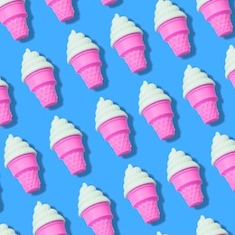 creative art made with ice cream pattern on blue color background.  