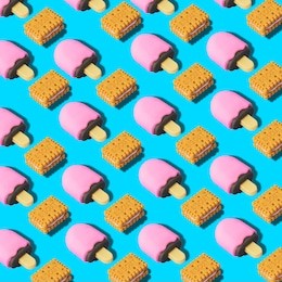 creative art made with cookies and ice cream pattern on blue background.