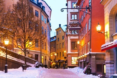 evening winter scenery of street in old town (gamla stan) in stockholm, sweden