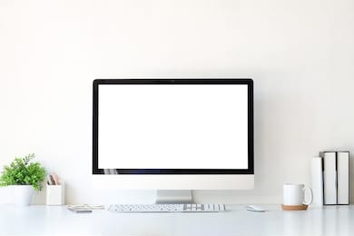 office desk workspace stuff with notepad, laptop and coffee cup mouse notepad shot. 