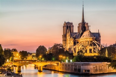 notre dame de paris by night and the seine river france in the city of paris in france