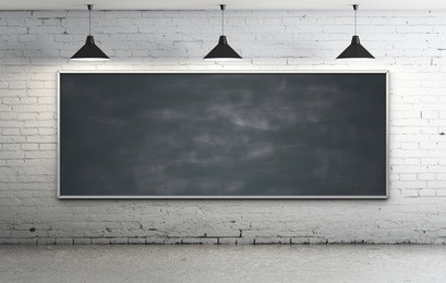 black blackboard in brick loft