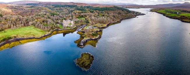 aerial autumn view of dunvegan castle, isle of skye - aerial