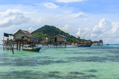 beautiful landscapes view borneo sea gypsy water village in bodgaya mabul island, semporna sabah, malaysia.