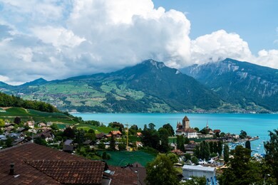 spiez castle with thun lake in switzerland