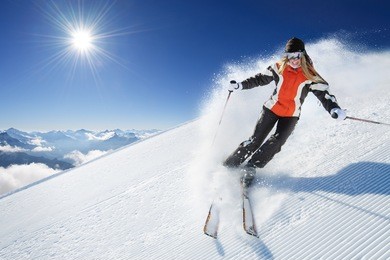 girl / woman / female on the ski