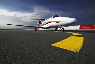 small business jet plane on a runaway