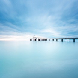 modern steel pier in a cold atmosphere long exposure photography in lido camaiore, versilia, tuscany, italy, europe