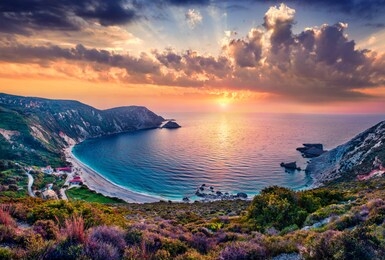 unbelievable summer view of petani beach. majestic sunset on cephalonia island, greece, europe. beautiful evening seascape of mediterranen sea. fantastic outdoor scene of ionian islands.