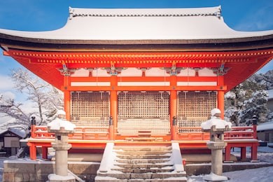 beautiful landscape in winter seasonal : red japanese pagoda covered with white snow in kiyomizu-dera temple, kyoto, japan.