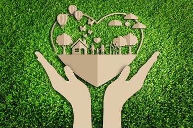paper art style of eco on green grass background.  save the earth.