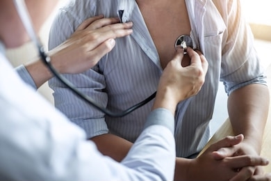 doctor using a stethoscope checking patient with examining, presenting results symptom and recommend treatment method, healthcare and medical concept.
