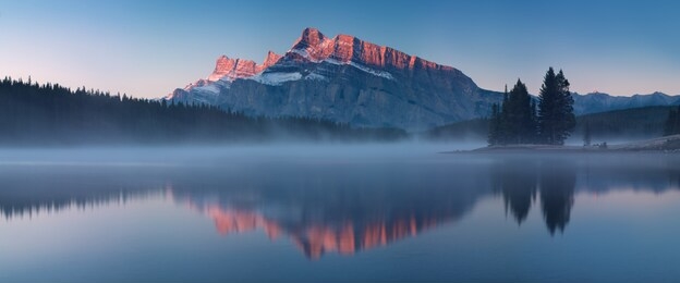 the mountain views when you are in two jack lake campground of banff national park in alberta, canada