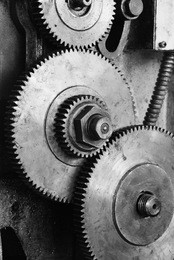 dirty gear of the old lathe machine on black and white