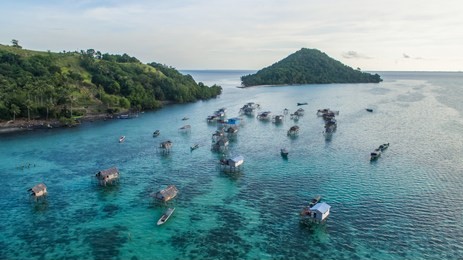 beautiful aerial view borneo sea gypsy water village in mabul bodgaya island, malaysia.