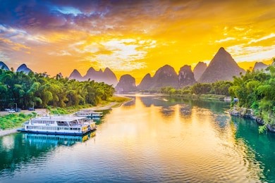landscape of guilin, li river and karst mountains. taken from yangshuo bridge. located in yangshuo, guilin, guangxi, china.