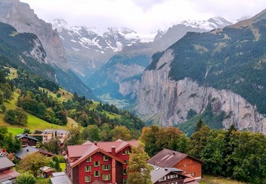 wooden houses in the murren mountains in switzerland on a cloudy day