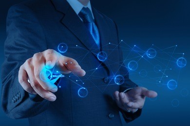 businessman hand pushing solution diagram on a touch screen interface