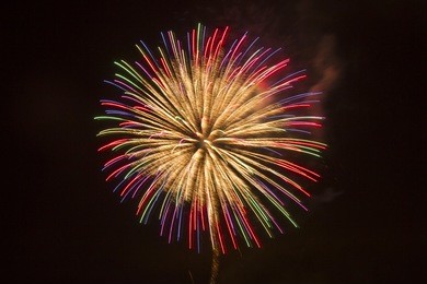 long exposure of  firework against a black sky