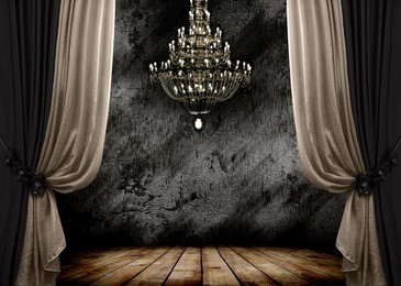 image of grunge dark room interior with wood floor and chandelier. background