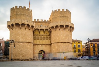 slow shutterspeed view of the serranos towers or torres serrano, a medieval gate in valencia.