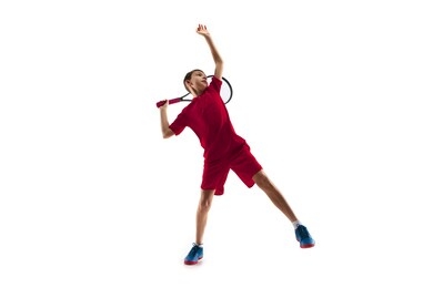 young teen boy tennis player in motion or movement isolated on white studio background. the sport, exercise, training concept