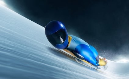 skeleton sport. athlete descends on a sleigh on an ice track.