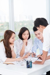 portrait of a business team brainstorming at office