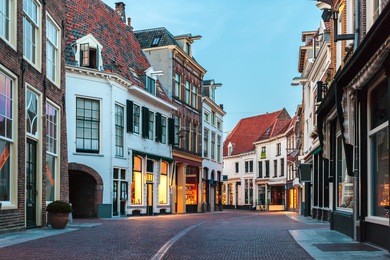 evening in a shopping street of the dutch ancient town zutphen