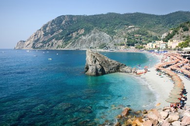 panorama of monterosso al mare beach, in summer season, a coastal village and resort in cinque terre, liguria, italy. 