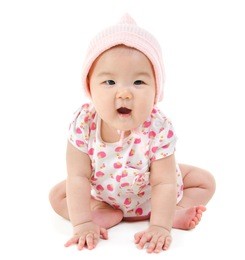 full body six months old east asian baby girl sitting on white background