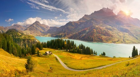 aerial morning view of roselend lake/lac de roselend. picturesque autumn scene of auvergne-rhone-alpes, france, europe. beauty of nature concept background.
