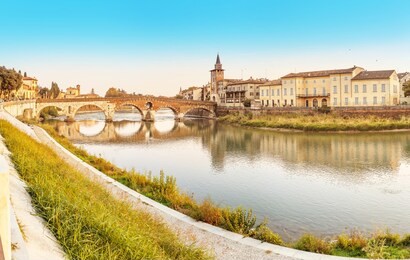 panoramic cityscape view of verona old town and bridge over adige river. travel destination in italy concept