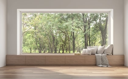 side window seat 3d render.there are white room,wood seat,decorate with many pillow.there are big  windows look out to see nature view.