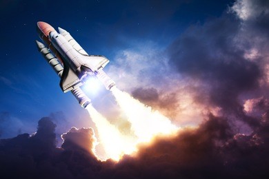space shuttle taking off on a mission