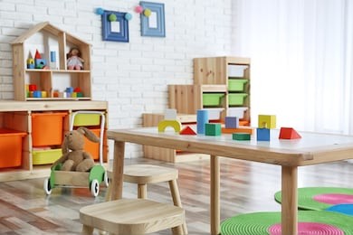 modern child room interior with table and stools