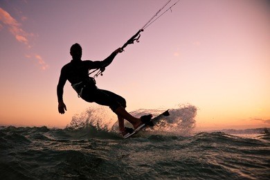 kite boarding. kitesurf freestyle at sunset.