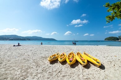 beautiful wave on the beach, clear water, white sand in your holliday at andaman sea phuket thailand.