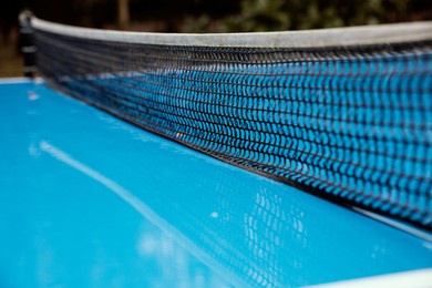 wet table tennis court on street