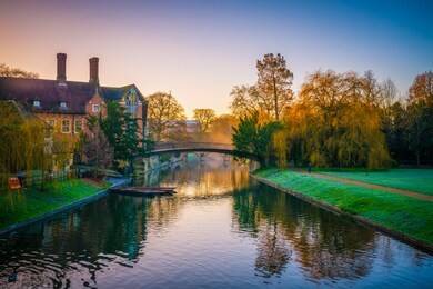 beautiful view of cambridge and the river cam at sunrise. england