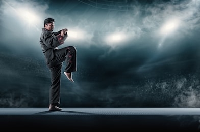 taekwondo action poses in stadium background.